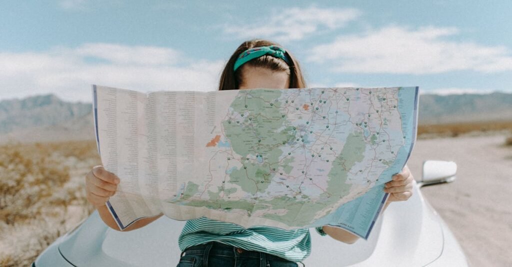 Woman holding a map over her face while exploring, representing the effortless style of using minimalist travel packing kits