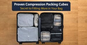 Open carry-on suitcase neatly organized with compression packing cubes for travel, showing efficient space-saving packing system.