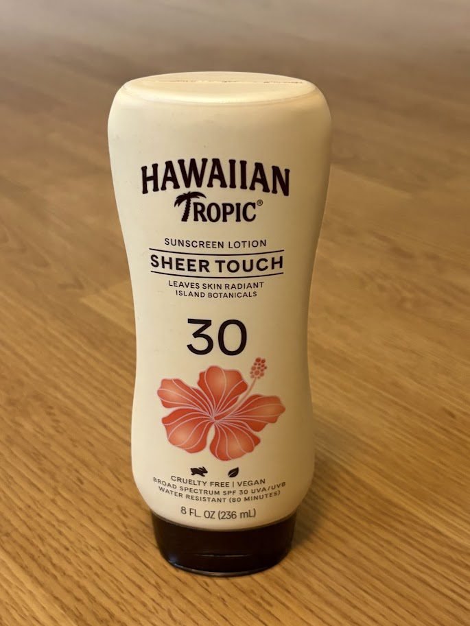 Hawaiian Tropic Sheer Touch SPF 30 best sunscreen for beach vacation lightweight lotion bottle