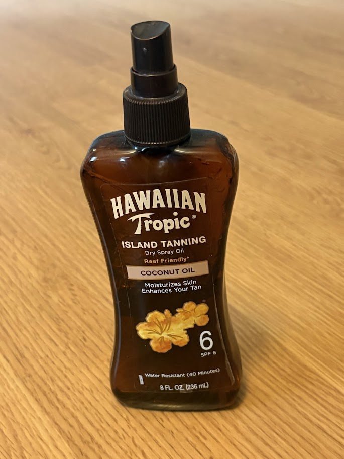 Hawaiian Tropic Island Tanning Oil SPF 6 best sunscreen for beach vacation lightweight spray oil