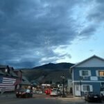 July 4th fireworks over the mountains on Main Street in Gardiner Montana near Yellowstone.